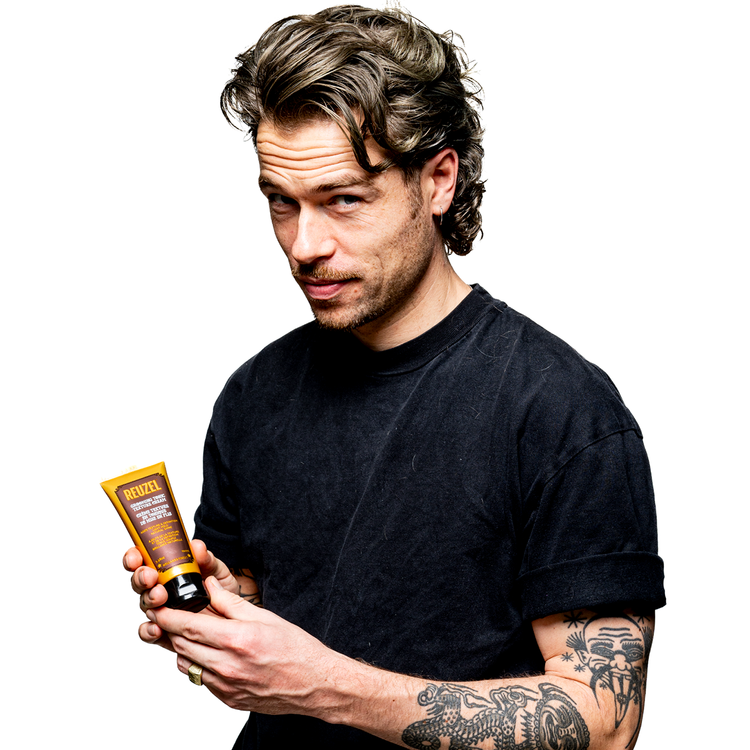Reuzel Grooming Tonic Texture Cream for hair styling, showing a jar with cream texture and modern packaging.