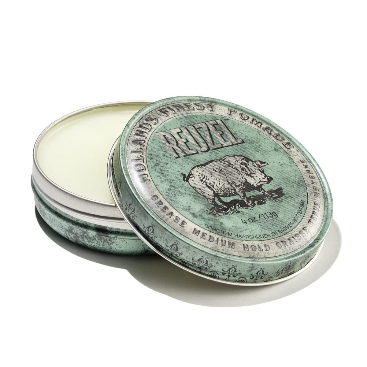 Reuzel green pomade grease with medium hold, showcasing the thick, glossy hair styling product in a jar.