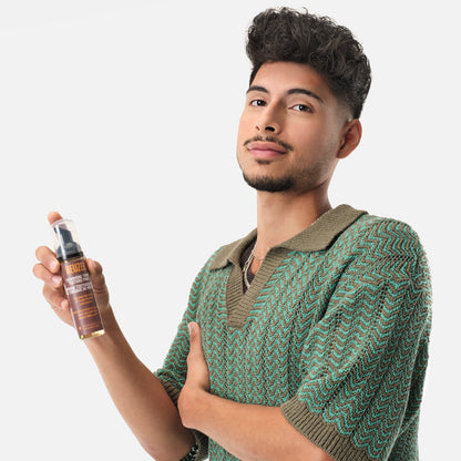 Reuzel Grooming Tonic Texture Foam in a bottle, hair styling product for adding volume and texture to hair.