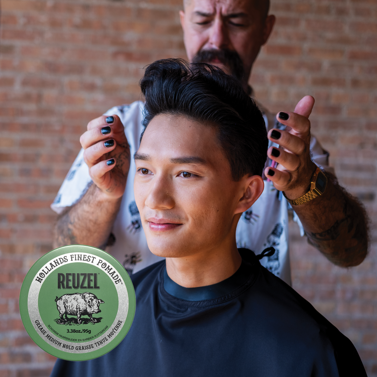 Green Reuzel Pomade grease jar showing branding and product label, ideal for styling hair with a classic, glossy finish.