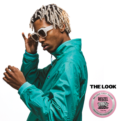 Reuzel Pink Pomade Grease jar with pink label and lid, showcasing the smooth, glossy pomade inside.