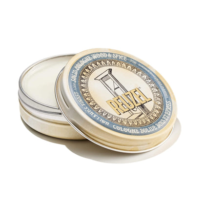 Reuzel Wood & Spice Solid Cologne Balm for beard grooming, featuring a natural wood and spice scent in a compact balm container.